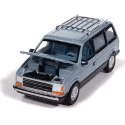 1987 Plymouth Voyager - Ice Blue Poly 1:64 Scale Diecast Model Car by Auto World