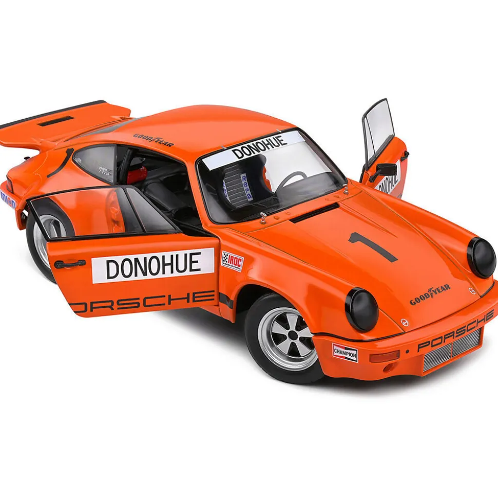 1974 Porsche 911 IROC Orange #1 Donohue IROC Daytona 1:18 Scale Diecast Model Car by Solido