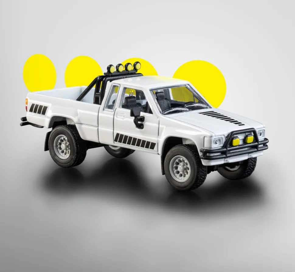 1985 Toyota Hilux SR5 1:64 Scale Diecast Model Truck by Jada Toys